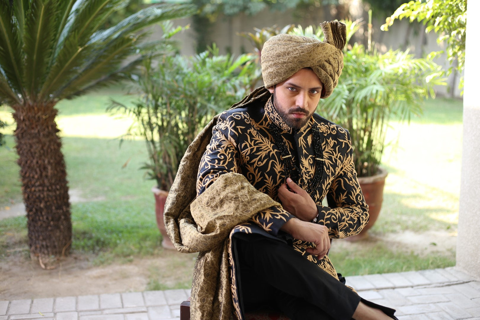 Magnificent Blackish Blue Gold Sherwani	Black n Blue