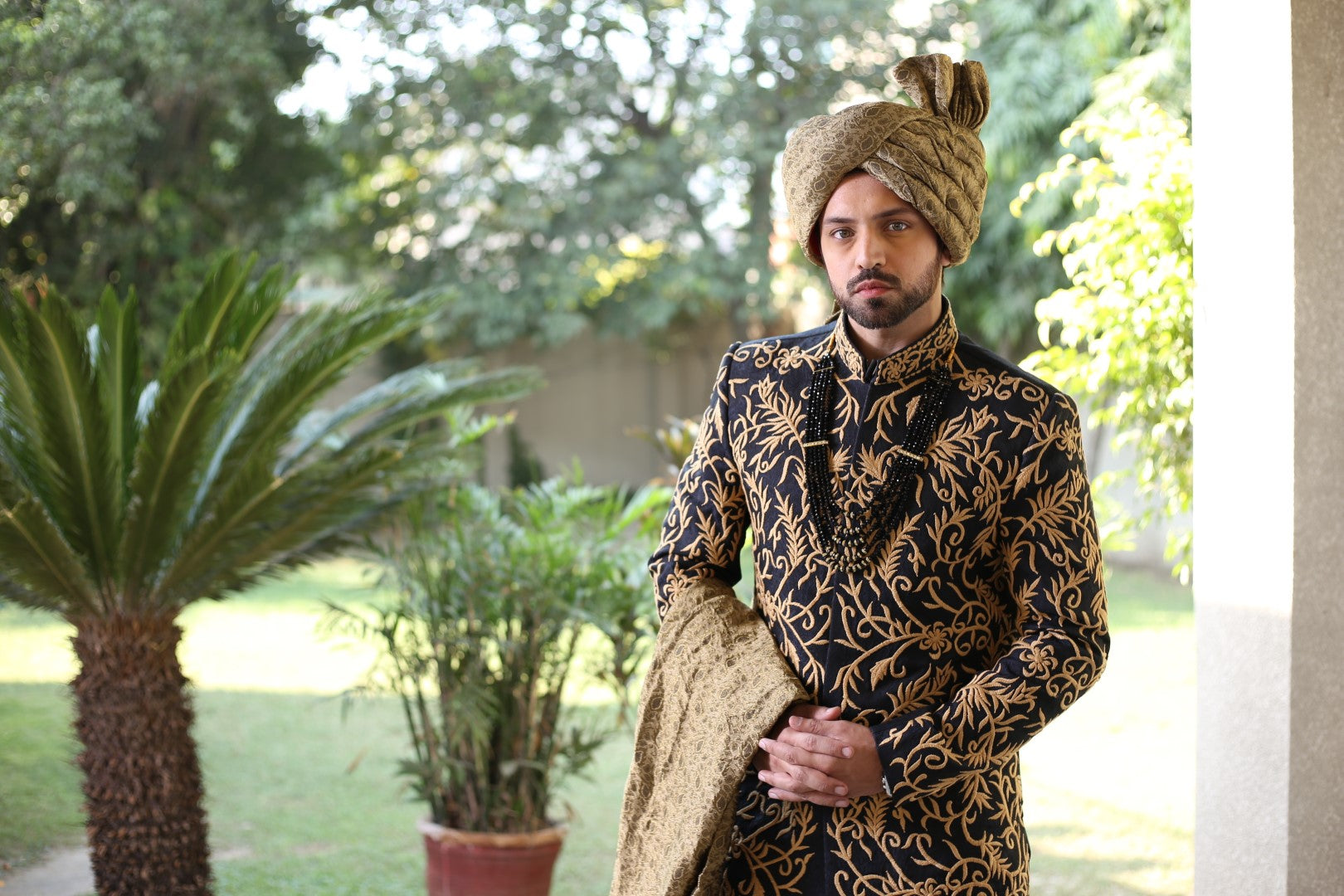 Magnificent Blackish Blue Gold Sherwani	Black n Blue